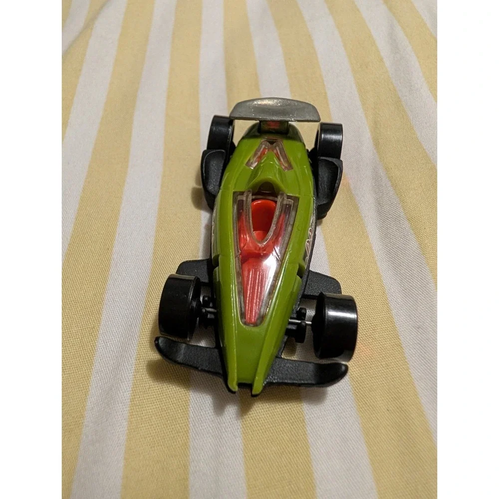 Hot Wheels 2012 Green Carbide Stunt Team Racer 1:64 Diecast Car Thailand